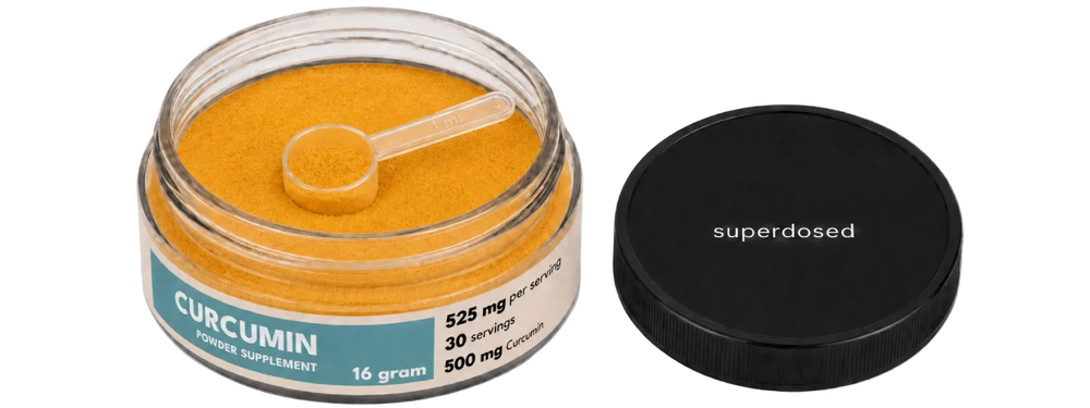 Jar of curcumin powder supplement with label on a white background