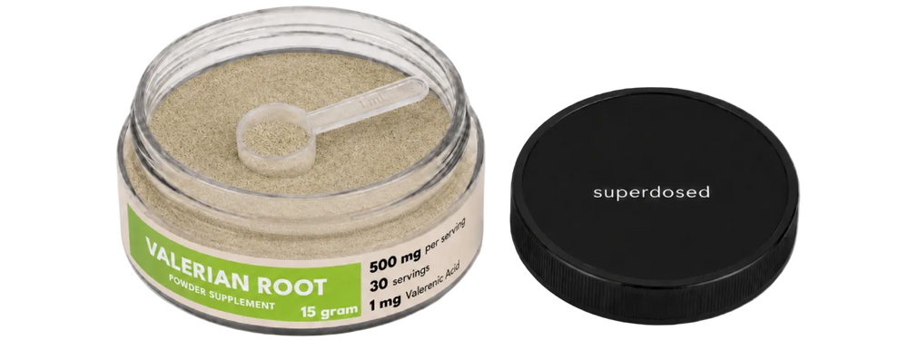 Jar of valerian root powder supplement with label on a white background